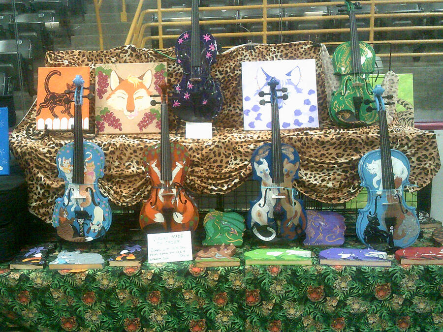 Halloween Cats I painted for AnthroCon's artshow. One Bushy Cat has appeared. It remains to be seen if I can figure out how to actually make a website. Personally, I'd rather have a nap in the sun, far away from the aggravations of the internet.